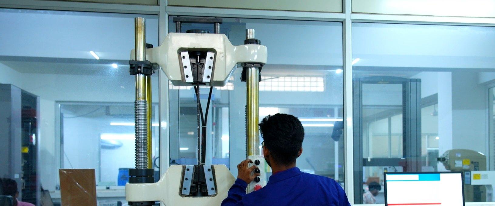 Tensile test on the universal testing machine in the QC laboratory